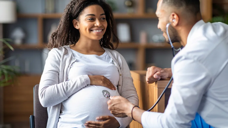 A doctor caring for an expectant mother